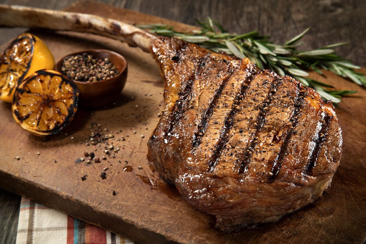 Reverse Sear Tomahawk Ribeye on the Big Green Egg Certified Angus Beef